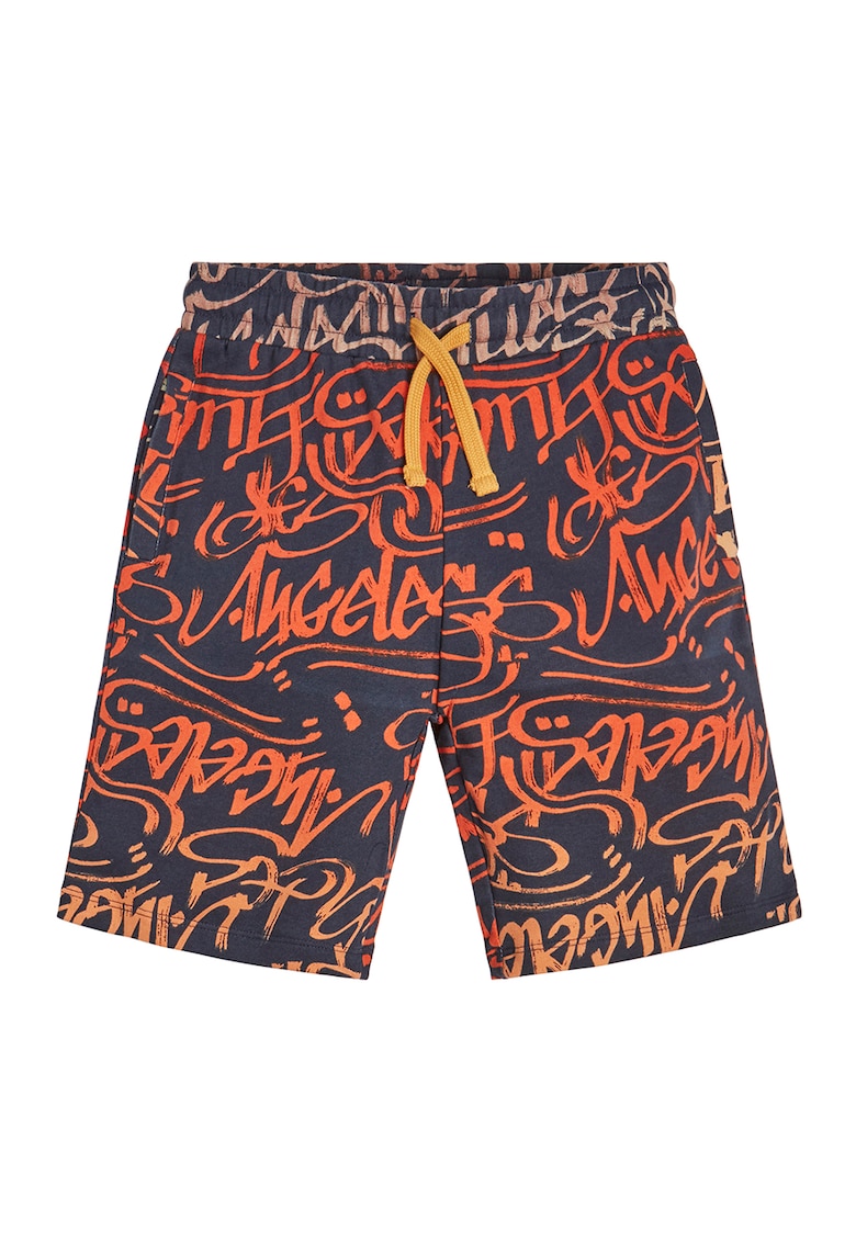 / Други / Къс панталон с шарки и връзка: Стилен избор за модерната жена